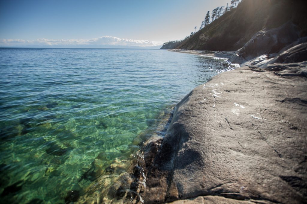 Clear turquoise water over rocks, Savary Island