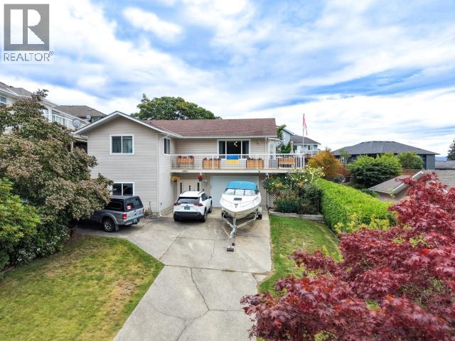 6886 HARVIE AVE